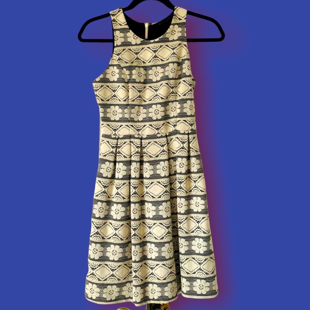 Lovely bell skirt dress. Ivory lace on black fabric. Super dressy!